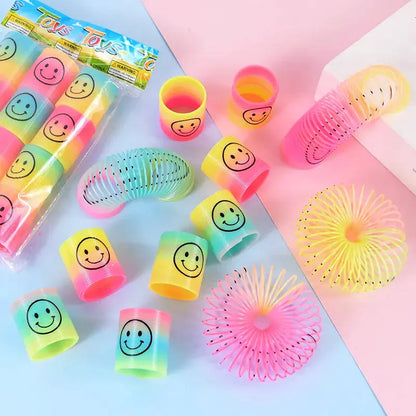 12Pcs Rainbow Magic Springs Circle Toys for Children Birthday Party Favors Giveaway Gifts Baby Shower Pinata Fillers Christmas - Baby World