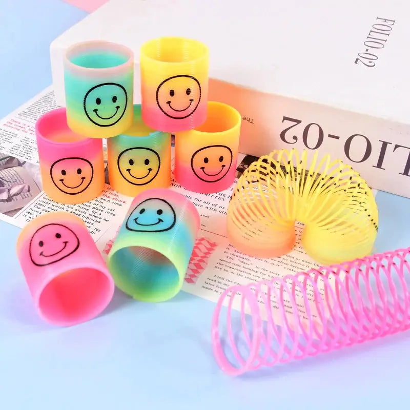 12Pcs Rainbow Magic Springs Circle Toys for Children Birthday Party Favors Giveaway Gifts Baby Shower Pinata Fillers Christmas - Baby World