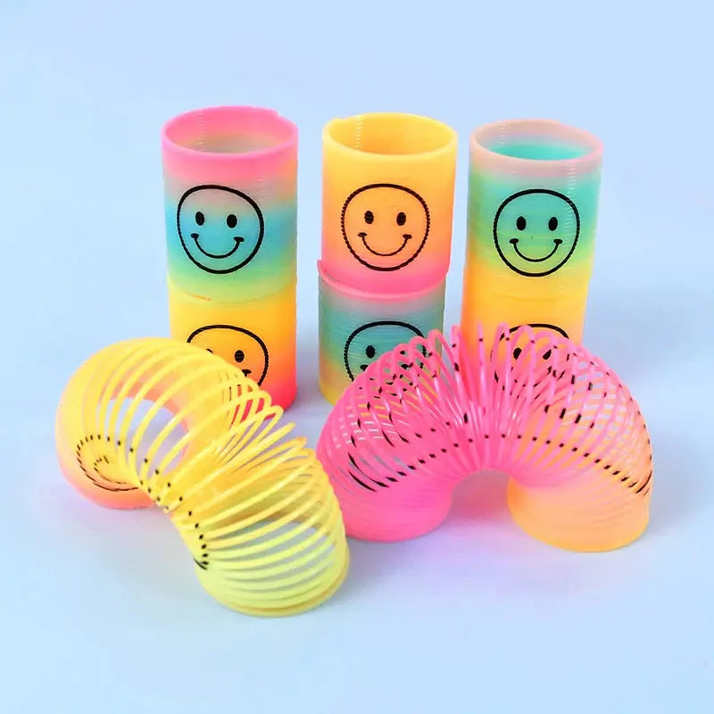 12Pcs Rainbow Magic Springs Circle Toys for Children Birthday Party Favors Giveaway Gifts Baby Shower Pinata Fillers Christmas - Baby World